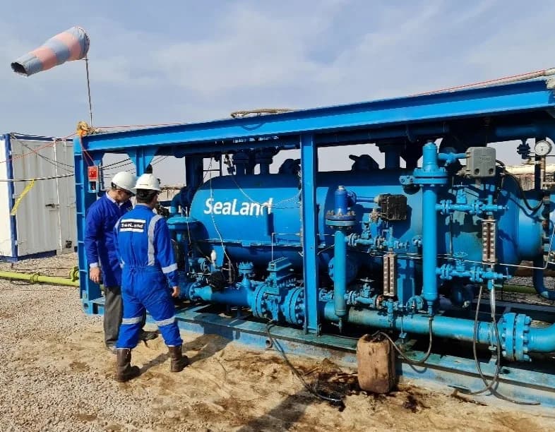 SeaLand crew at a well testing skid