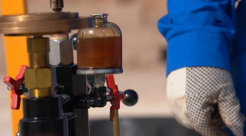 Crude oil sample being taken